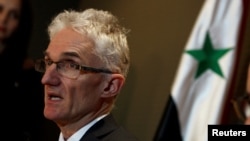 FILE - Mark Lowcock, U.N. undersecretary-general for humanitarian affairs and emergency relief coordinator, speaks during a news conference in Damascus, Syria, Jan. 11, 2018.