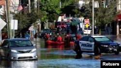 Sisa-sisa Badai Tropis Ida membawa hujan lebat, banjir bandang dan angin puting beliung ke bagian timur laut di Mamaroneck, New York. (Foto: Reuters)