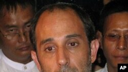 United Nations envoy Tomas Ojea Quintana speaks to journalists at Yangon international airport in Yangon, Burma (File Photo)