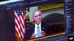 FILE - This image from a fake video features former President Barack Obama and the elements of facial mapping used in technology that lets anyone make videos of real people appearing to say things they've never said.