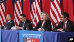 From left, Chinese State Councilor Dai Bingguo, China's Vice Premier Wang Qishan, Secretary of State Hillary Rodham Clinton, and Treasury Secretary Timothy Geithner take part in a joint meeting of the US-China Strategic and Economic Dialogue, May 10, 201
