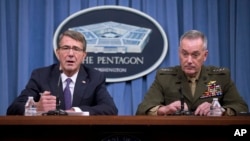 Defense Secretary Ash Carter, accompanied by Joint Chiefs Chairman Gen. Joseph Dunford, announces that U.S. forces killed a senior Islamic State leader, among several key members of the militant group eliminated this week, during a news conference at the Pentagon, March 25, 2016.