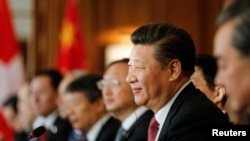 FILE - China's President Xi Jinping attends official talks in Bern, Switzerland.
