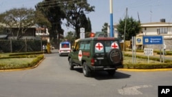 Bodies of Kenyan soldiers are transported by ambulances as they arrive at Wilson airport, Nairobi Kenya, Jan 27, 2017. A spokesman for extremist group al-Shabab says its fighters have killed at least 51 Kenyan soldiers in an attack on an army base in Kulb