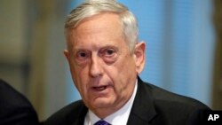 Defense Secretary Jim Mattis answers a question about the ambush of U.S. troops in Niger before a meeting with Israeli Defense Minister Avigdor Lieberman at the Pentagon, Oct. 19, 2017, in Washington.