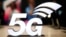 A banner of the 5G network is displayed during the Mobile World Congress wireless show, in Barcelona, Spain, Feb. 25, 2019. 