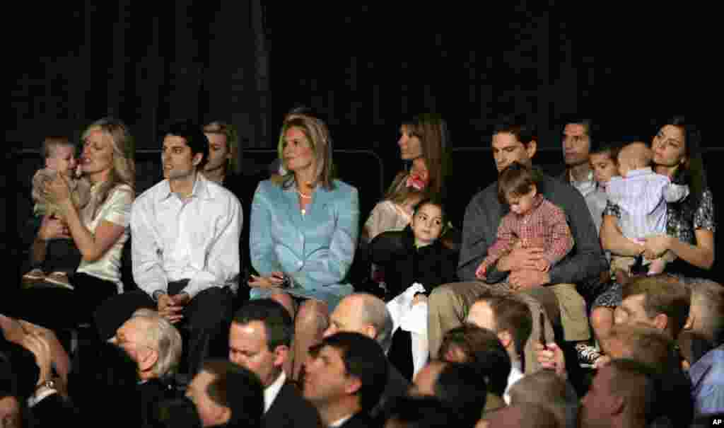Ann Romney, at center left in blue suit, sits with her family as Gov. Mitt Romney announces his candidacy for president at The Henry Ford Museum in Dearborn, Mich., February 13, 2007.