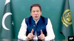In this image taken from video provided by U.N. Web TV, Imran Khan, prime minister of Pakistan, remotely addresses the 76th session of the United Nations General Assembly, Sept. 24, 2021, at U.N. headquarters in New York City.