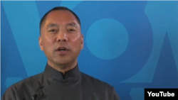 FILE - Chinese government critic Guo Wengui speaks to VOA's Mandarin Service, April 19, 2017. 