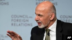 FILE - The office of Afghan President Ashraf Ghani says a new election date will be announced in a month.