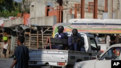 Police patrol the streets of downtown Port-au-Prince, Haiti, on Jan. 22, 2024. Six Roman Catholic nuns who were kidnapped about a week ago were released on Jan. 24.