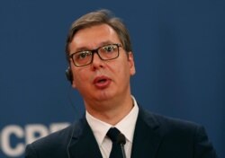 FILE - Serbian President Aleksandar Vucic speaks during a news conference in Belgrade, July 15, 2019.