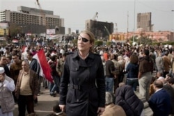 FILE - War correspondent Marie Colvin, photographed here in Tahrir square in Cairo, was killed in Syria in 2012. (AP/Ivor Prickett Sunday Times)