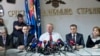 Serbian ultranationalist politician Vojislav Seselj, center, speaks at a press conference in Belgrade, Serbia, March 31, 2016. 