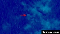 Debris from what could be Malaysian Airlines flight MH370 is seen in this satellite image from China's State Administration for Science, Technology and Industry for National Defense.