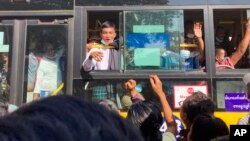 Prisoners released from Insein prison are welcomed by their colleagues and family members, in Yangon, Myanmar, Jan. 4, 2023. 