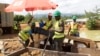 Workers separate gold without toxic chemicals such as mercury and arsenic in a formalized small-scale mining in southeastern Ghana, May 23, 2019.