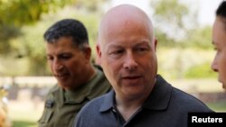 Jason Greenblatt, center, U.S. President Donald Trump's Middle East envoy, arrives to visit Kibbutz Nahal Oz, just outside the Gaza Strip, in southern Israel, Aug. 30, 2017.