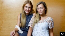 Maddie Marlow, left, and Tae Dye, of Maddie & Tae, pose for a portrait at Love Shack Studio in Nashville, Tennessee, Aug. 27, 2015. 