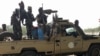 FILE - Soldiers of the Chad Army sit on the back of a Land Cruiser at the Koundoul market, 25 km from N'Djamena, Jan. 3, 2020, upon their return after a months-long mission fighting Boko Haram in neighboring Nigeria.