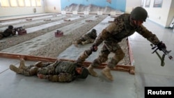 Afghan National Army soldiers take part in a training exercise at the Kabul Military Training Center in Kabul, Afghanistan Jan. 27, 2019.