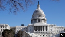 Work continues on the stand for the inauguration of President-elect Donald Trump on the west front of the Capitol in Washington, D.C., Dec. 28, 2016.
