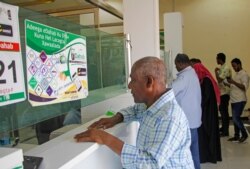 On April 2, 2020, Abdalla Sabdow, a father of six in Mogadishu, Somalia, checks to see if money from his cousin who lives in New York has arrived, but didn't because his cousin is on lockdown and unable to make the transfer.