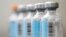 FILE - vials of flu vaccine in Philadelphia.