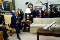 President Donald Trump speaks during a meeting with Italian President Sergio Mattarella in the Oval Office of the White House, Wednesday, Oct. 16, 2019, in Washington. (AP Photo/Evan Vucci)