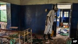 The tuberculosis ward at Malakal Teaching Hospital, South Sudan, Tuesday, July 1, 2014, where many of the murdered people were getting treatment. The hospital has been looted. Patients were shot in their hospital beds, medical and humanitarian staff killed, and medical facilities were destroyed in fighting.(AP Photo/Matthew Abbort)