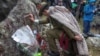 A supplied image of Royal New Zealand Army officer Colonel Glenn King lays a wreath during the Indigenous Anzac Day commemoration event held on Mount Ainslie in Canberra, Australia, April 25, 2017. 