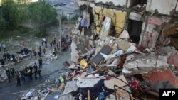 This photograph shows the remains of an apartment building destroyed during an airstrike in Kharkiv, Ukraine, Sept. 24, 2024.