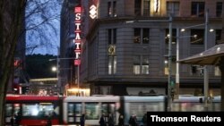 People walk through the city center of Sydney, Australia, Sept. 4, 2020. 