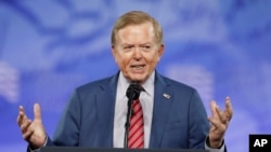 FILE - Lou Dobbs speaks at the Conservative Political Action Conference (CPAC), on Feb. 24, 2017, in Oxon Hill, Md.