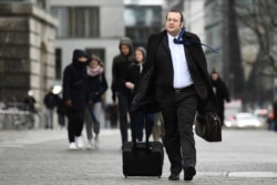 FILE - Erfan Kasraie, an Iranian science journalist from Kassel, is pictured in Berlin, Germany, Jan. 30, 2020.