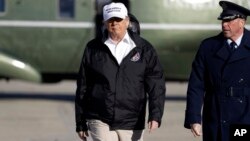 President Donald Trump walks to board Air Force One for a trip to the southern border, Jan. 10, 2019, in Andrews Air Force Base, Md.