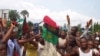 ** FILE ** Supporters of the Movement for the Actualization of the Sovereign State of Biafra, MASSOB, protest in the streets of Aba, eastern Nigeria, Dec. 5 2005. MASSOB has struck chords among many Igbo.