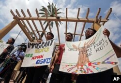 Supporters of the Deferred Action for Childhood Arrivals Act (DACA) and others demonstrate outside the U.S. District Court 9th Circuit in Pasadena, California, May 15, 2018.