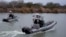 Border Patrol agents cruise along the Rio Grande at the U.S.-Mexico border, Feb. 13, 2025, in McAllen, Texas.