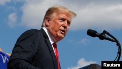 U.S. President Donald Trump delivers a speech following a tour of Fincantieri Marinette Marine in Marinette, Wisconsin, June 25, 2020. 