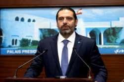 In this photo released by Lebanon's official government photographer Dalati Nohra, Lebanese Prime Minister Saad Hariri, speaks after a Cabinet meeting in Baabda, east of Beirut, Lebanon, Oct. 21, 2019.