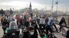 Iranians attend a rally marking the 42nd anniversary of the Islamic Revolution, at Azadi (Freedom) Square in Tehran, Iran, Feb. 10, 2021.