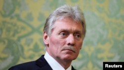 FILE PHOTO: Kremlin spokesman Dmitry Peskov attends a meeting between Russian President Vladimir Putin and Iranian President Ebrahim Raisi in Moscow
