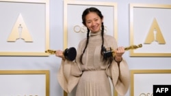 Chinese Director/Producer Chloe Zhao, winner of the award for Picture and Director for 'Nomadland,' poses in the press room at the Oscars on April 25, 2021, at Union Station in Los Angeles.