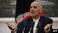 Afghan president Mohammad Ashraf Ghani speaks during a press conference at Presidential Palace in Kabul on June 30, 2018. 