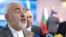 FILE - Iranian Foreign Minister Javad Zarif speaks with the media after a meeting in Brussels, May 15, 2018. 