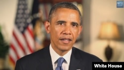 President Barack Obama is seen delivering his weekly address (White House video screen grab).
