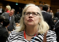 FILE - Laura Kennedy, a former U.S. ambassador to Turkmenistan and former U.S. permanent representative to the Conference on Disarmament in Geneva, attends a meeting in Vienna, Austria, Sept. 16, 2014.