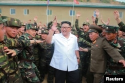 FILE - North Korea leader Kim Jong Un inspects Unit 1524 of the Korean People's Army in this undated photo released by North Korea's Korean Central News Agency, June 30, 2018.