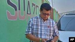 Martin Suazo Sandoval stands outside his family's hotel in Azacualpa, Honduras, on March 27, 2024, one day after his brother, Maynor Yassir Suazo Sandoval, went missing when the bridge he was working on in Baltimore, Maryland, collapsed.